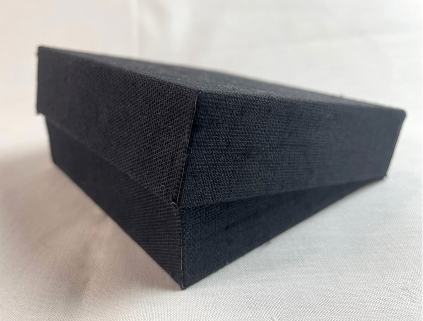black clamshell box closed